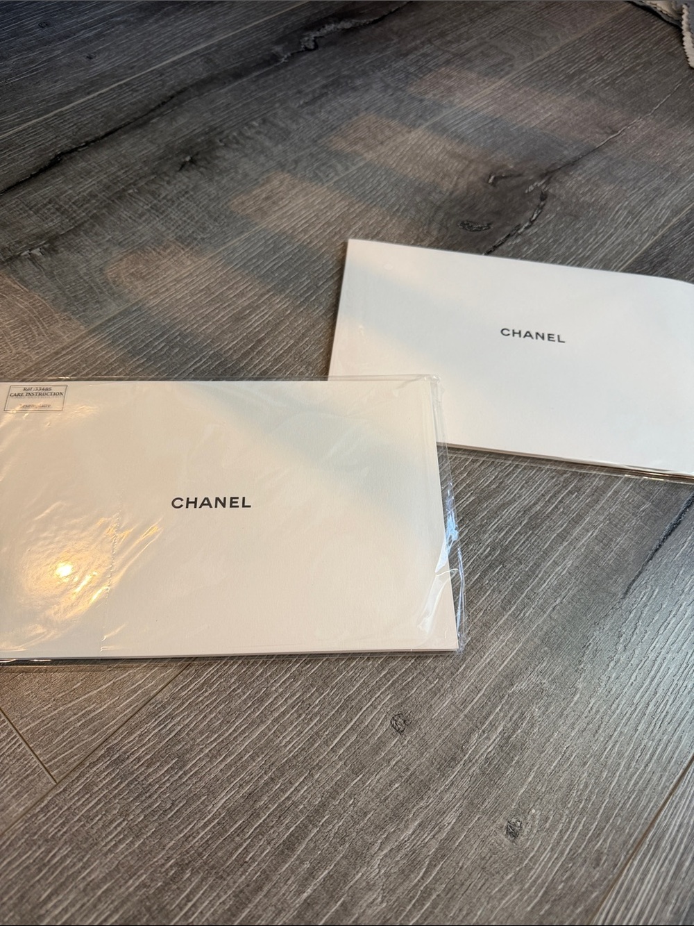 2 packs of CHANEL Classic Care Booklet with cleaning cloth